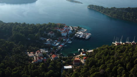 Landscape-Of-The-Coastline-Of-Mljet-Croatia-With-Boats-And-Houses---aerial-drone-shot