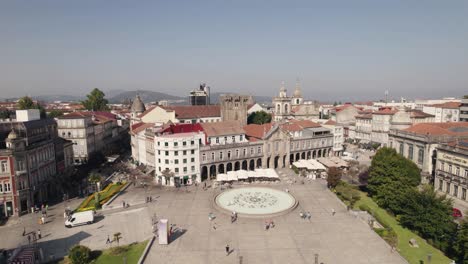 People-walking-in-Braga-downtown-across-the-republic-square-and-lapa-church