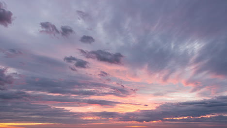 Colourful-sunset-time-lapse-of-cloud-layers-forming-and-decaying