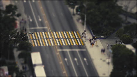 pedestrian-crossing-as-traffic-halts-to-let-them-pass-on-a-3-lane-highway
