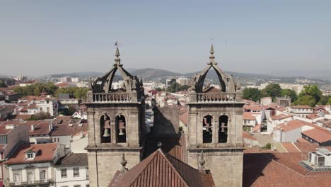 Flying-forward-Braga-Historic-Cathedral-Beatiful-bell-towers-at-City-Centre---Portugal