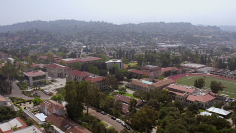 Aerial-pan-over-Occidental-college-campus-in-Eagle-Rock-in-Los-Angeles,-California-on-a-beautiful-summer-day