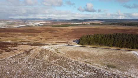 Smooth-flyover-of-Northumberland-Landscape,-UK.-Dolly-Shot