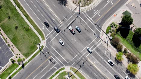 Intersection-Traffic-with-Cars-Driving-on-City-Road---Aerial-Overhead-Top-Down-View