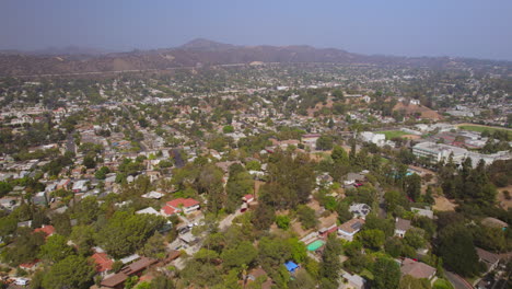 Aerial-flyover-houses-in-Eagle-Rock-neighborhood-in-Los-Angeles,-California-on-a-beautiful-day