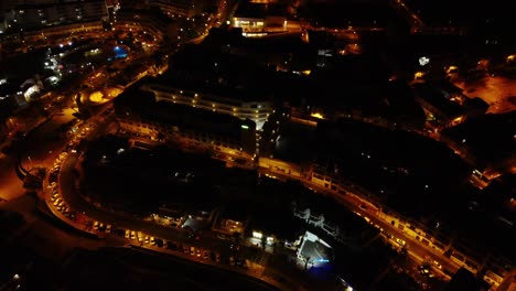 Amazing-Night-time-Drone-Shot-of-City-In-Spain-Tenerife-Los-Gigantes-On-top-Of-Mountain-Drone-Shot-in-4K-South-Island