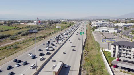 Aerial-View-of-Multi-lane-Highway-Interstate-in-Utah,-Vehicles-Slowly-Moving-in-Traffic
