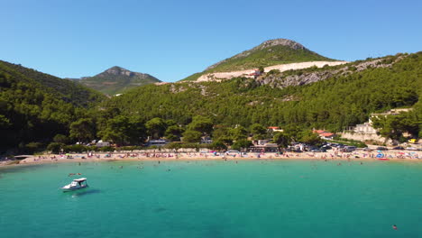 Tourist-On-Holiday-At-Beach-Prapratno-In-Peljesac-Peninsula,-Southern-Dalmatia,-Croatia