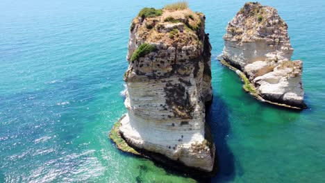 Raouche-Rocks,-Iconic-Rock-Formations-In-Beirut,-Lebanon---aerial-drone-shot