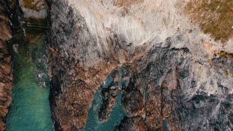 aerial-drone-top-view-of-cliffs-and-ocean