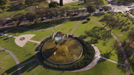 Birds-eye-view-of-giant-stainless-steel-and-aluminum-flower,-Floralis-Generica-in-Buenos-Aires,-Argentina