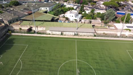 Soccer-field-aerial-view-from-drone,-Italy
