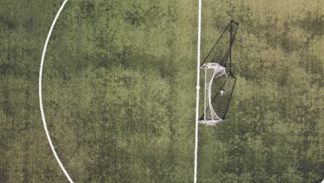 Aerial-overhead-view-of-soccer-net-from-drone---Italy