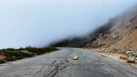 Movement-of-clouds-on-an-abandoned-road