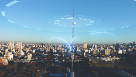 Aerial-orbit-shot-of-5G-Telecommunication-Towers-Cellular-Network-Antenna-Signal-Waves-supply-city-with-internet---Digital-glowing-lines-motion-graphic-during-sunset-and-skyline-in-background