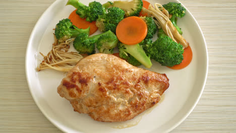 grilled-chicken-steak-with-vegetable-on-white-plate