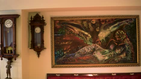 vintage-clocks-on-the-wall-and-scary-satanic-painting-horror-scene-thriller-mysterious-smooth-motion