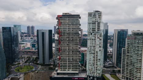 Hyperlapse-with-jib-up-in-business-sector-in-Mexico-City-at-a-cloudy-day
