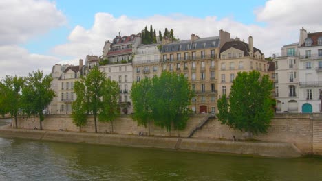 Ile-Saint-Louis-buildings-with-Quai-Orleans-Seine-River-in-Paris,-France---4k
