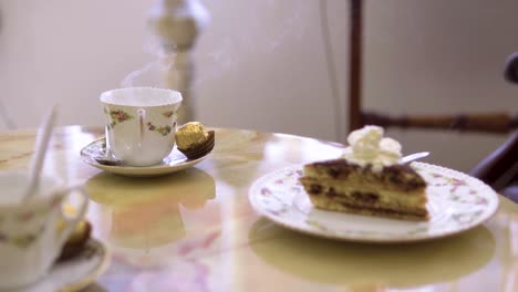 freshly-prepared-cup-of-coffee-with-cake-as-a-dessert-served-on-an-old-fashioned-plate