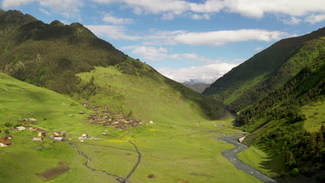 Wide-rotating-drone-shot-Dartlo-village-in-Tusheti-Georgia-with-medieval-combat-towers