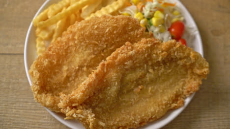 fish-and-chips-with-mini-salad-on-white-plate