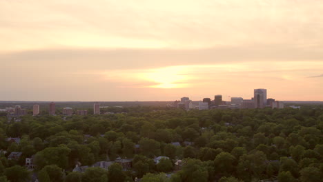 Clayton-skyline-against-beautiful-sunset-and-over-a-nice-neighborhood-with-a-slow-pan-right