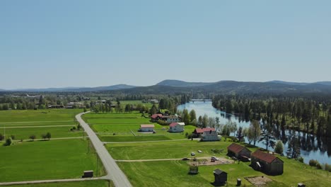 Small-Village-Of-Äppelbo-At-the-Waterfront-Of-Västerdal-River-In-Dalarna-County,-Sweden