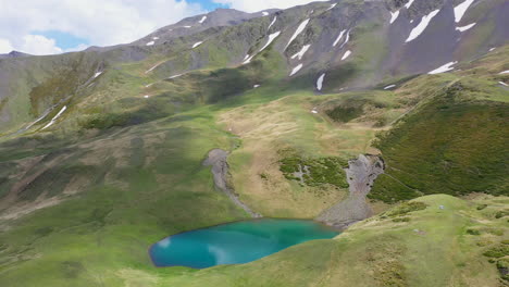 Cinematic-drone-shot-of-Oreit-Lake-in-Tusheti-Georgia,-in-the-Caucasus-mountains