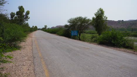 A-panning-view-of-an-ancient-road-in-the-Punjab,-Pakistan