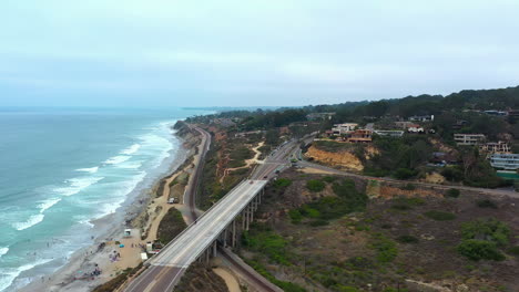 Aerial-View-Of-North-Torrey-Pines-Road-Bridge-At-Pacific-Ocean-Coastline-In-The-State-Of-California