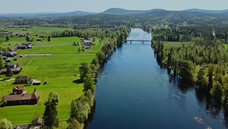 Appelbo-Village-At-The-Riverbank-Of-Västerdal-River-In-Dalarna-County,-Sweden
