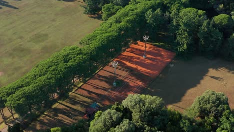 Tennis-Court-At-The-Surrounded-With-Lush-Green-Trees-In-Brijuni-Islands,-Croatia