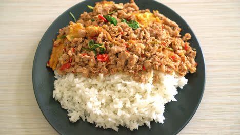 stir-fried-minced-pork-with-basil-and-egg-topped-on-rice---Asian-food-style
