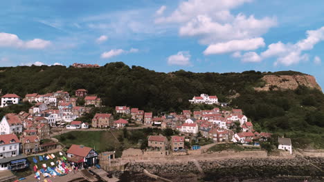 North-York-Moors,-Heritage-Coast,-Runswick-Bay,-Drone-Footage-of-Village-from-above-decending---Clip-9