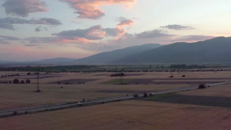 Beautiful-sunset-flight-towards-Balkan-mountains-in-the-Kazanlak-valley-Bulgaria-lavender-fields