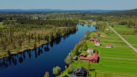 The-Calm-Water-Of-Västerdal-River-Lies-In-Äppelbo-Village,-Dalarna,-Sweden