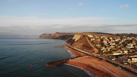 Aerial-View-Of-West-Bay-During-Morning-Sunrise-In-Dorset