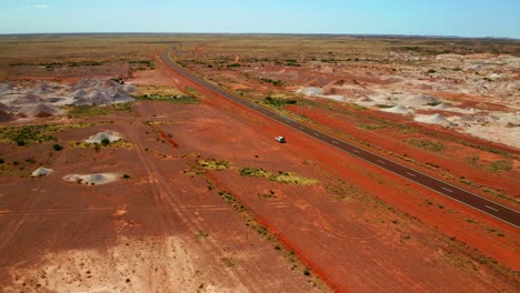 Vehicle-Park-On-Red-Deserted-Area-By-The-Country-Road-Of-Stuart-Highway-During-Summer-In-Northern-Territory,-Australia