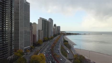 Cinematic-Aerial-Shot-of-Lake-Shore-Drive-and-North-Avenue-Beach-in-Chicago