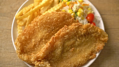 fish-and-chips-with-mini-salad-on-white-plate