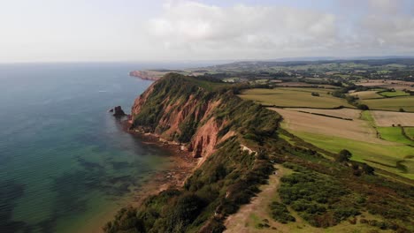 Aerial-View-Of-Picturesque-English-Coastline-In-Devon