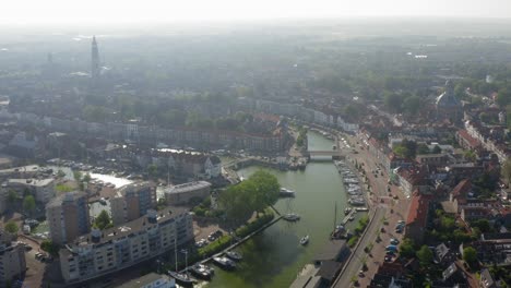Aerial-shot-of-the-historical-town-of-Middelburg,-the-Netherlands,-on-a-sunny-summer-evening