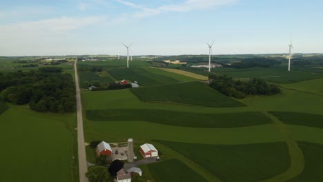 Amazing-Aerial-Establishing-View-of-Rural-Farm,-Wind-Turbines
