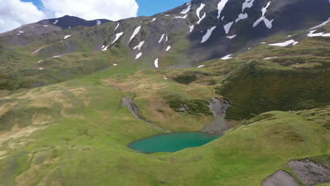Revealing-drone-shot-of-Oreit-Lake-in-Tusheti-Georgia,-in-the-Caucasus-mountains