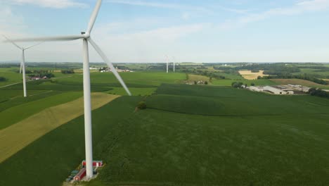 Beautiful-Aerial-View---Wind-Turbine-on-Rural-Farmland-Produces-Renewable-Energy