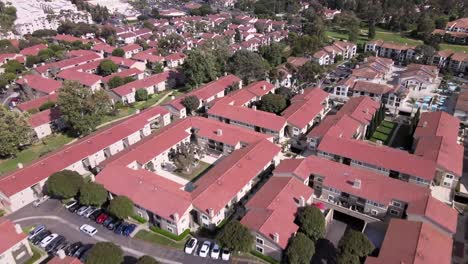 Above-La-Jolla-neighborhood-with-Verano-Condominiums-red-roofs,-San-Diego,-aerial