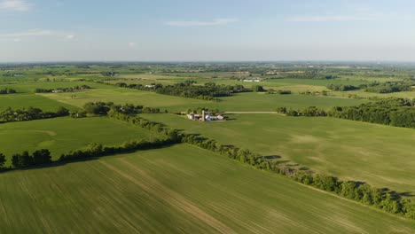 Aerial-Hyperlapse-High-Above-Rural-Farm-Landscape-on-Beautiful-Summer-Afternoon