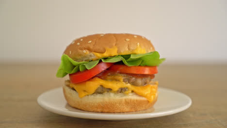 pork-burger-with-cheese-on-plate