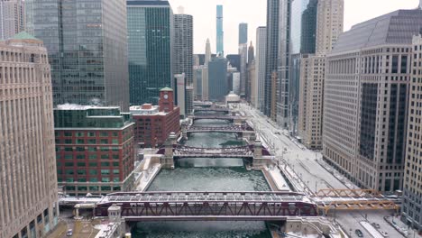 High-Aerial-View-Above-Chicago-River-in-Winter